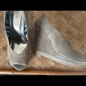 4in tan suede wedge heals. Great with jeans, shorts or with your favorite dress.